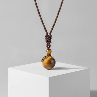 Pendentif Boule Oeil de Tigre : Protection & Confiance